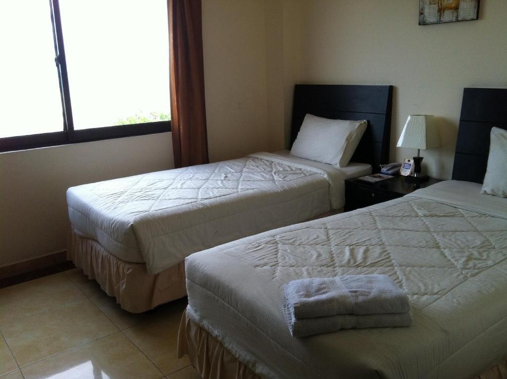 Grand Duta Hotel Palu Chambre photo