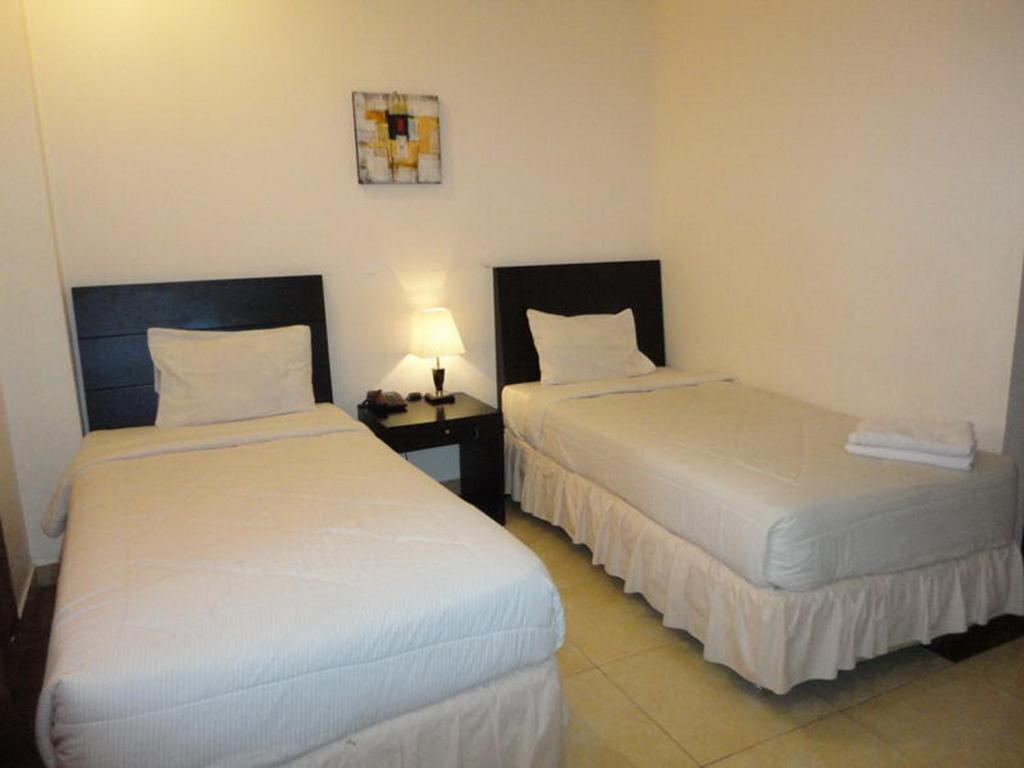 Grand Duta Hotel Palu Chambre photo