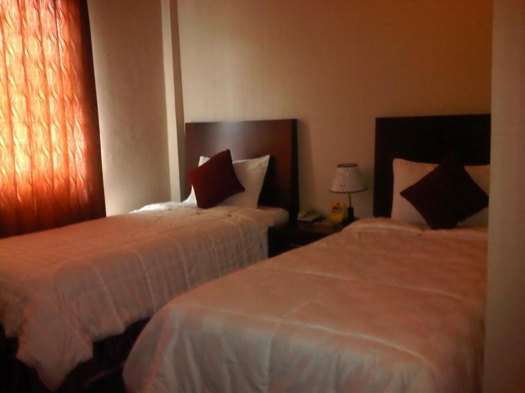 Grand Duta Hotel Palu Chambre photo