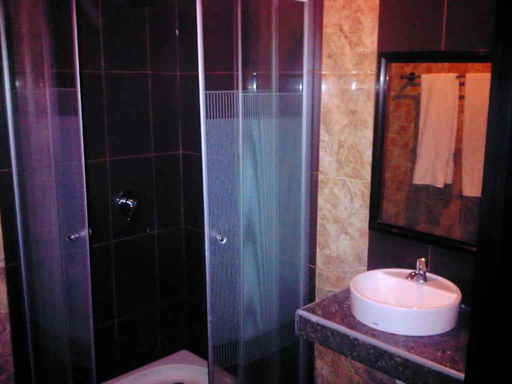 Grand Duta Hotel Palu Chambre photo