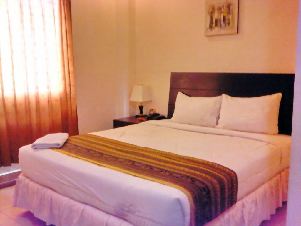 Grand Duta Hotel Palu Chambre photo